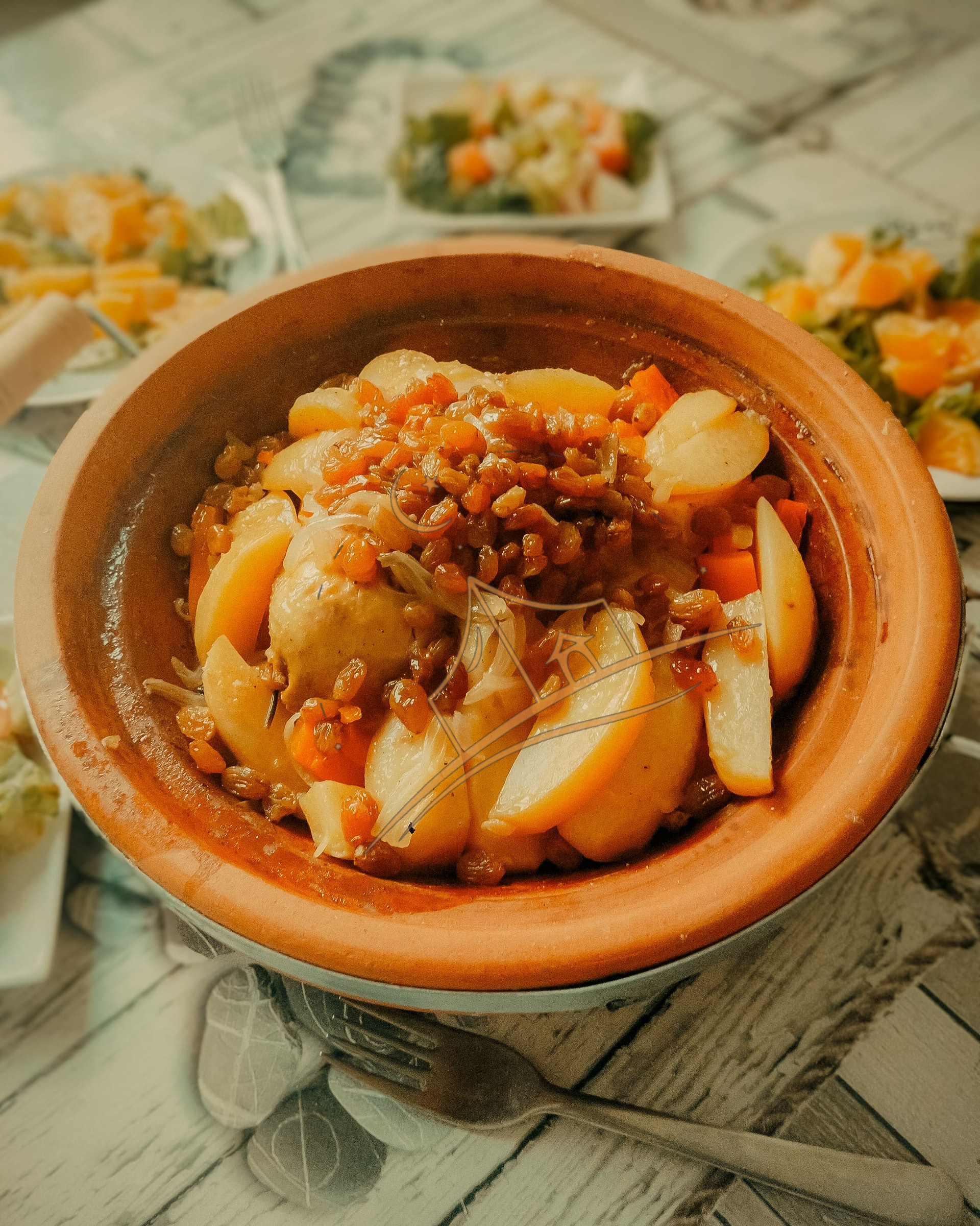 Sweet lamb tagine with caramelized onions, raisins and stewed apples